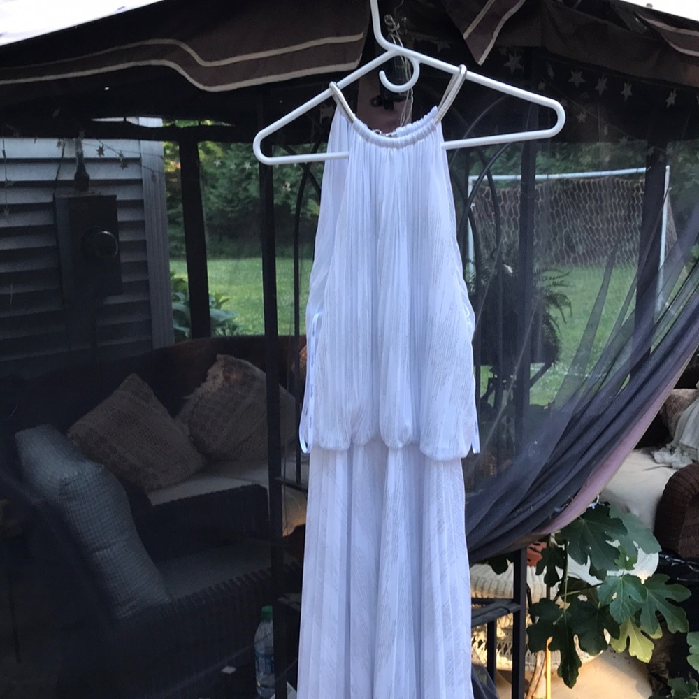 Size 14. Gorgeous white  dress lined perfect condition  and very flattering!